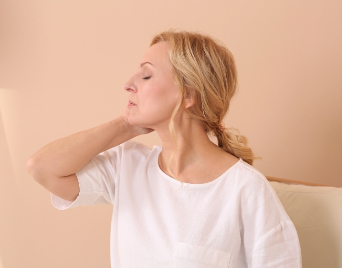 Woman experiencing fatigue and mood changes from hormonal imbalance