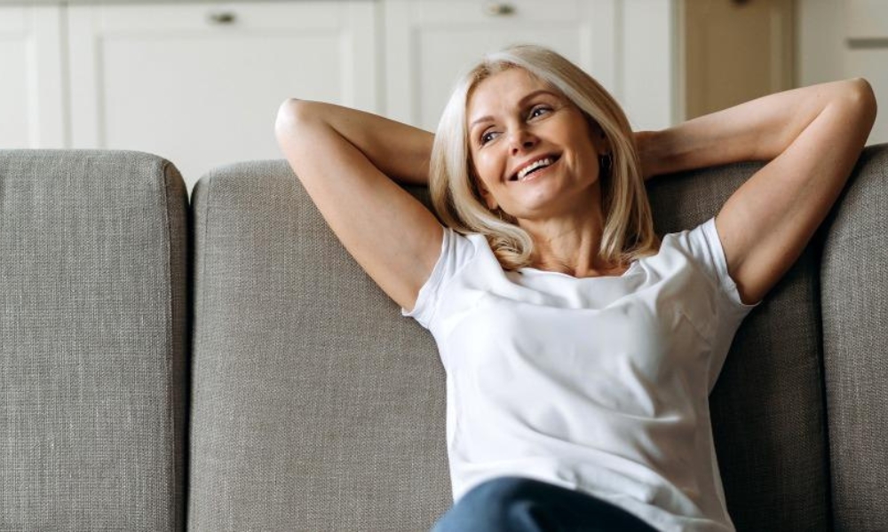 Female urogynecologist explaining hormone replacement therapy options and menopause care to a patient in Katy Texas
